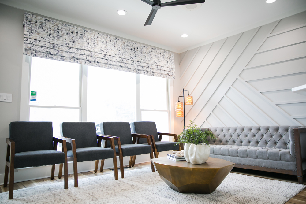 Comfortable seating area with accent wall